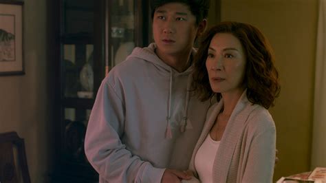 In ‘The Brothers Sun,’ Michelle Yeoh again leads an immigrant family with dark humor  –  but new faces